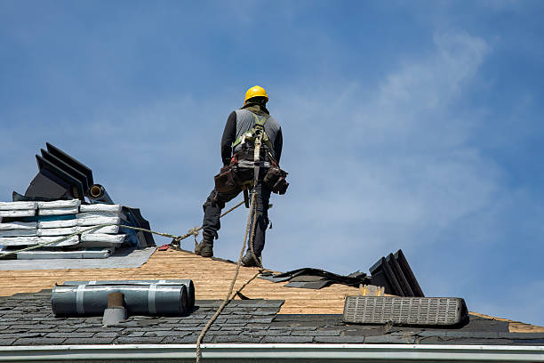 Professional Flat Roof Repair technician working in Tangent, OR